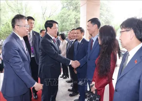 Chủ tịch nước Lương Cường gặp gỡ cộng đồng người Việt Nam tại Trung Quốc